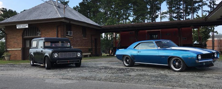 Hopkins Repair LLC | A black and a blue car